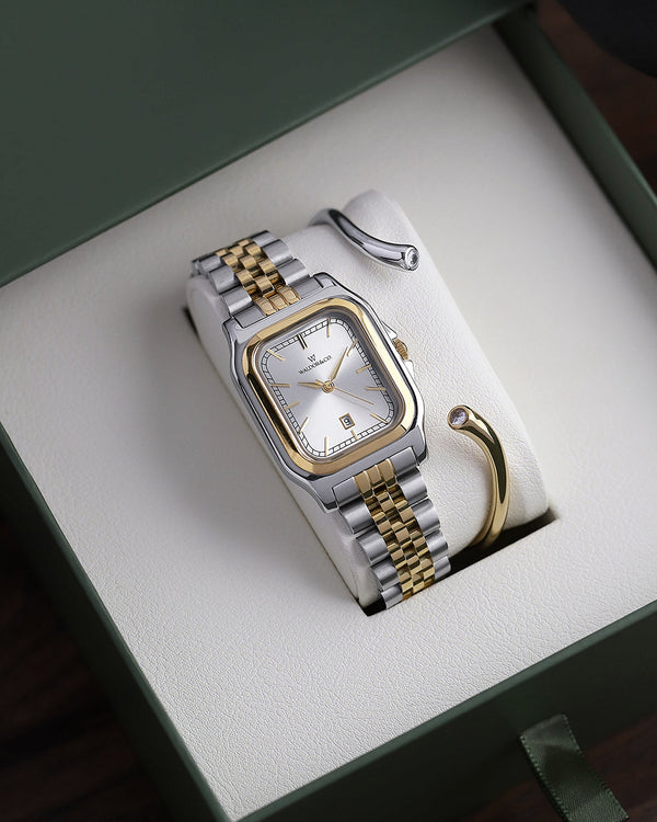 lifestyle_image, A square womens watch in silver and 14k gold from Waldor & Co. with silver sunray dial and a second hand. Seiko movement. The model is Delight 32 Chelsea 28x32mm.
