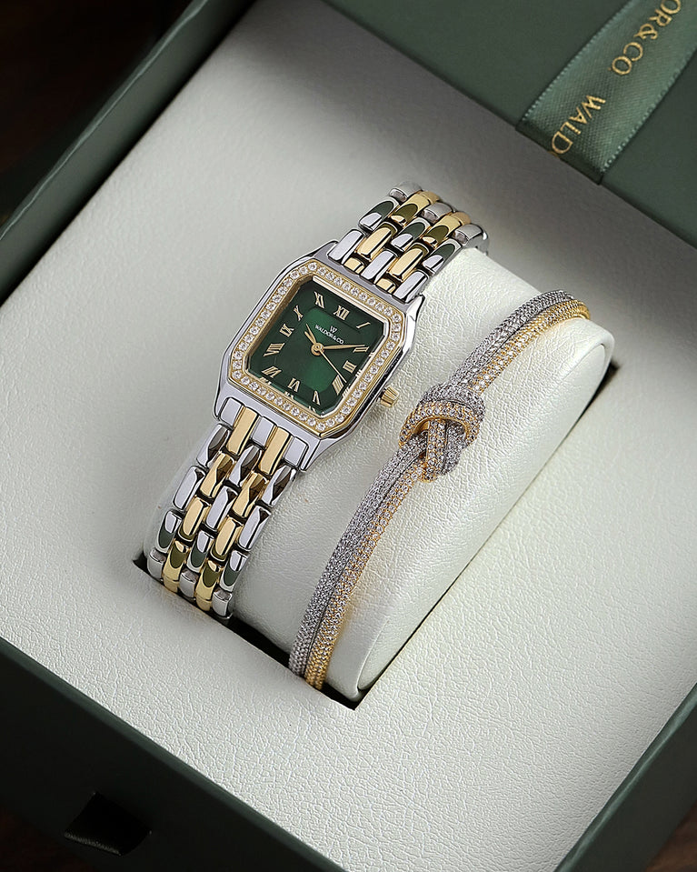  A square womens watch in Rhodium-plated 316L stainless steel from Waldor & Co. with emerald green dial. Bezel with premium crystals. Diamond Cut Sapphire Crystal glass dial. Seiko movement. The model is Eternal 22 Bellagio Pavè.