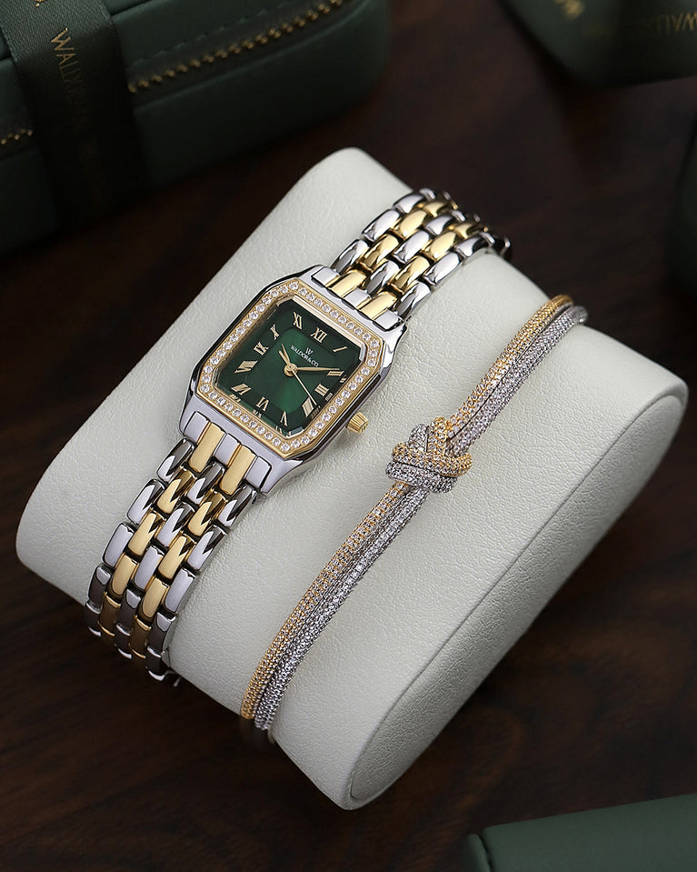  A square womens watch in Rhodium-plated 316L stainless steel from Waldor & Co. with emerald green dial. Bezel with premium crystals. Diamond Cut Sapphire Crystal glass dial. Seiko movement. The model is Eternal 22 Bellagio Pavè.