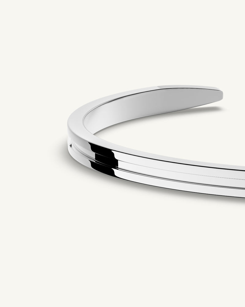 A Square Bangle in 925 Sterling Silver from Waldor & Co. The model is Demure Bangle Sterling Silver.