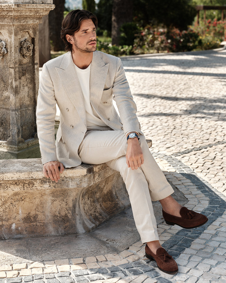  A polished stainless steel bangle in silver from Waldor & Co. One size. The model is Como Bangle Dual Polished