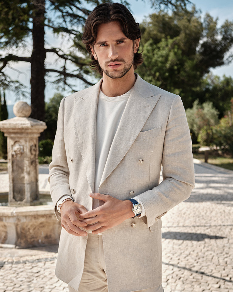  A polished stainless steel bangle in silver from Waldor & Co. One size. The model is Como Bangle Dual Polished