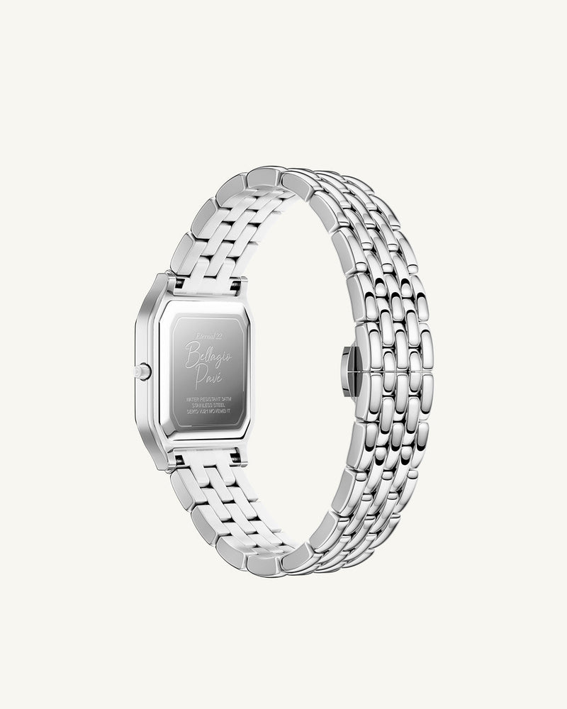 A square womens watch in Rhodium-plated 316L stainless steel from Waldor & Co. with dark blue dial. Bezel with premium crystals. Diamond Cut Sapphire Crystal glass dial. Seiko movement. The model is Eternal 22 Bellagio Pavè.